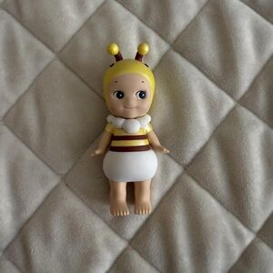 Adorable Bee-Inspired Action Figure with Yellow and White Outfit